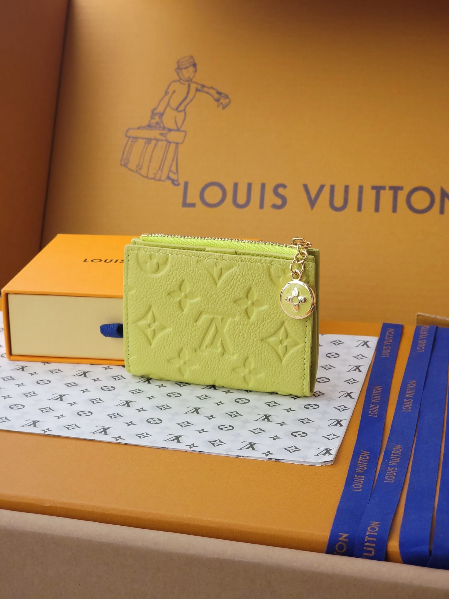Made from iconic Monogram Empreinte leather, this brightly coloured Lisa wallet pays homage to the House's heritage while offering a playful twist. This colourful design features an enamel zipper adorned with the iconic Monogram flower charm and features multiple coin and bill pockets on the interior, as well as four business card slots.