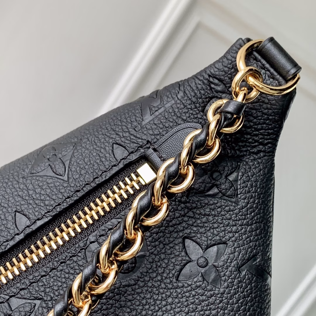 This distinctive High Rise belt bag is reinterpreted this season in iconic Monogram Empreinte Bd leather. Like the original, this PM style is practical with an adjustable shoulder strap and is large enough to hold everyday essentials. Decorated with gold hardware, the belt bag features a removable decorative luggage tag that pays homage to the brand's trunkmaking heritage, and can be carried crossbody or as a belt.