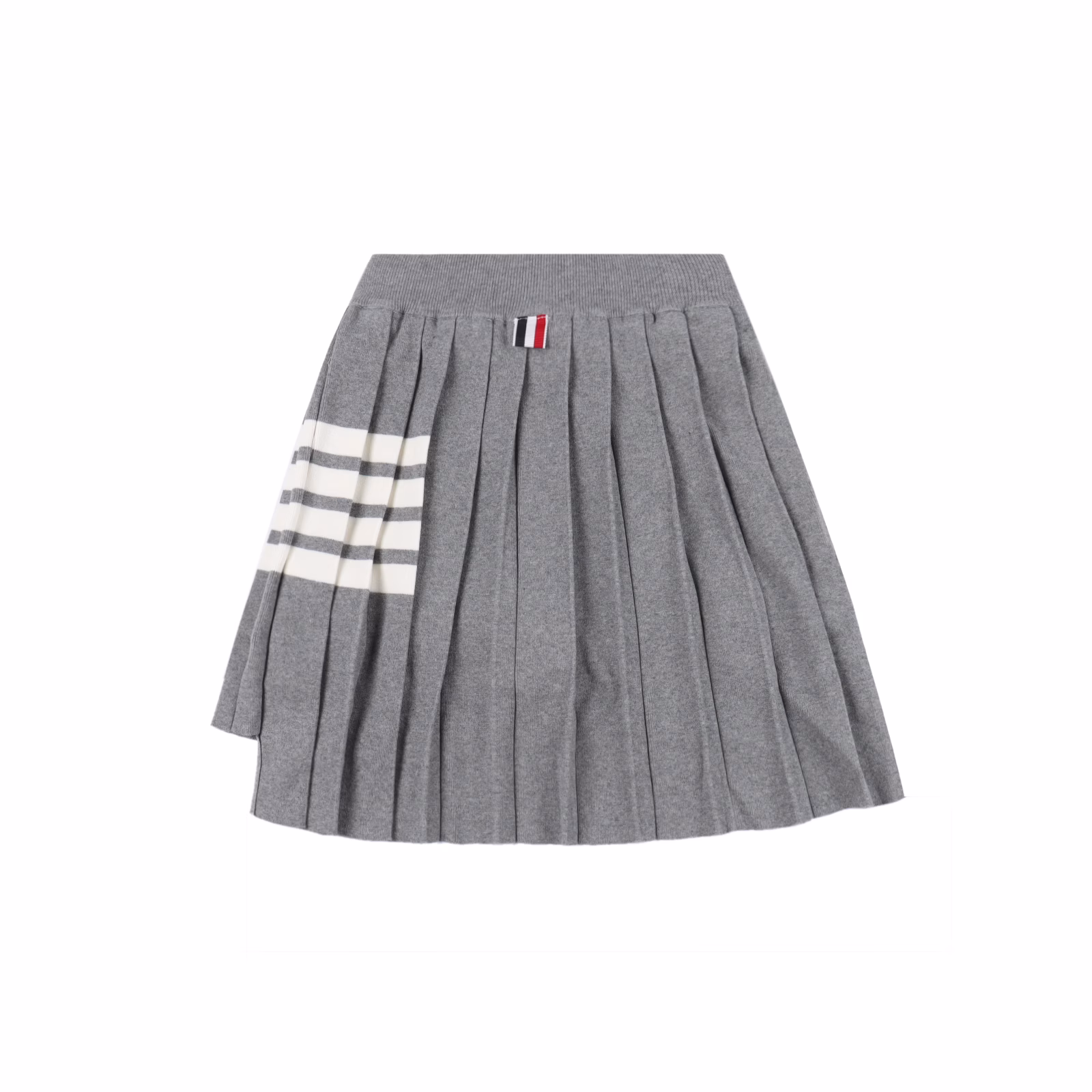 Thom Browne TB yarn-dyed four-bar knitted pleated skirtIt looks great with anything. Custom-made round-head three-color zipper, short front and long back design, each pleat is shaped by sewing, so there is no need to worry about it falling apart or not being there after washing. Custom-made wool blended fabric, making a half skirt, more silhouette! The lining also uses classic red, white and blue vertical stripes