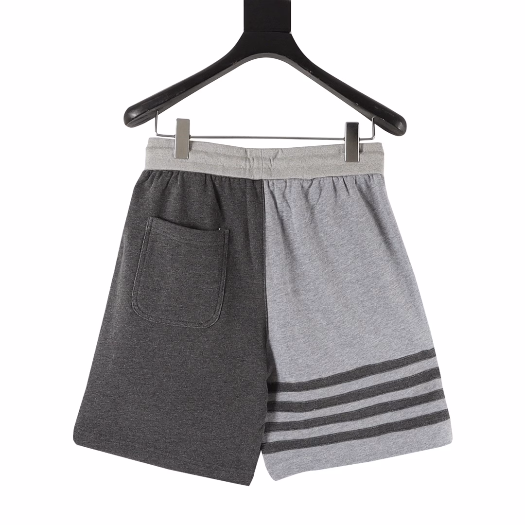 Tom Brown Four-bar Animal Embroidered ShortsThe fabric is made of professional custom-made 32s surface with delicate touch and 8s lining, which is crisp and stylish, with a gram weight of up to 380g, and a minimum order quantity of 500kg (equivalent to 1,000 pieces). The pocket cloth is made of red, white and blue woven Oxford fabric. The red stripes on the market are all orange-red. The minimum order quantity for pocket cloth alone is 3,000 meters. The workmanship is completely restored to the latest version of the counter, and the old pocket hemming and side pressure line are improved.