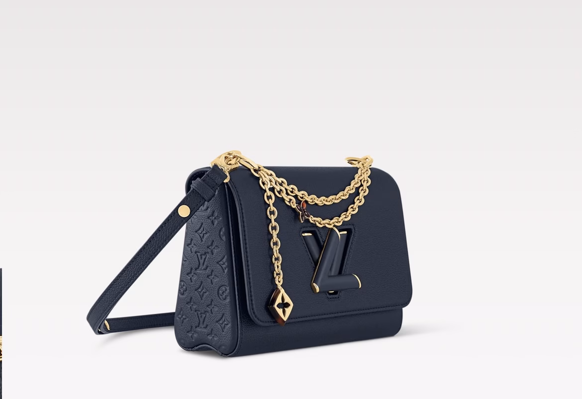 For the Harmony collection, this Twist MM slim bag features a decorative chain inspired by the monogram flower and the Puffygram jewelry collection. This version features the LV Twist clasp and is made from Taurus leather, a timeless color, with rose added for an interesting finish. The removable mirror can be used for makeup touch-ups