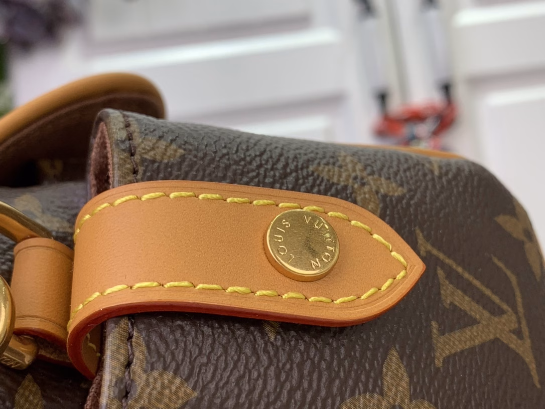 The Steamer Mini Bag is crafted from Monogram canvas with distressed calfskin trim and striking hardware. The new square lock recalls Pharrell Williams' signature Damier motif, the delicate key connects to the delicate bead chain, and the adjustable strap allows for shoulder and crossbody wear.