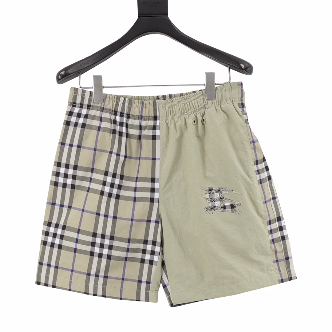 Burberry classic oblique plaid patchwork beach shortsThe style is stylish and fashionable for everyone. The back pocket is decorated with equestrian knight logo applique embroidery, which is low-key and luxurious. The imported fabric is light and delicate. The classic elastic waist style is versatile and makes the upper body look slim and tall.