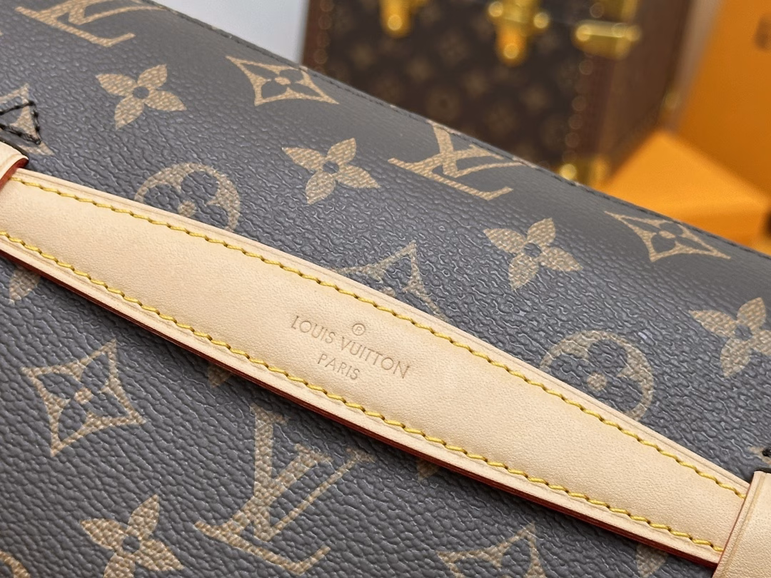 Made from classic Monogram canvas and embellished with a 
