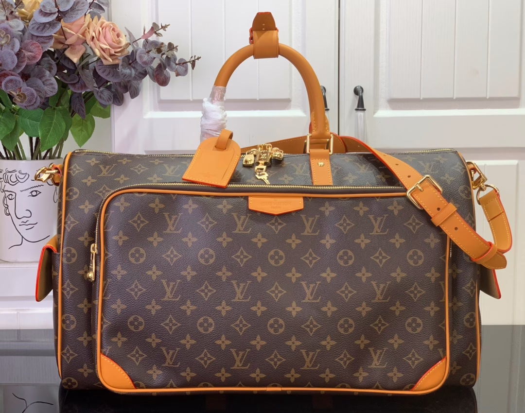 The Keepall Cargo 50 is a modern nod to the House's iconic design from the Monogram Archive collection. Made from Monogram coated canvas, it features distressed calfskin trims and striking hardware, while the main compartment and front pocket zipper pulls are embellished with metallic beads, a nod to Pharrell Williams's latest twist.