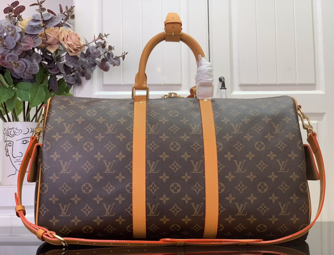 The Keepall Cargo 50 is a modern nod to the House's iconic design from the Monogram Archive collection. Made from Monogram coated canvas, it features distressed calfskin trims and striking hardware, while the main compartment and front pocket zipper pulls are embellished with metallic beads, a nod to Pharrell Williams's latest twist.