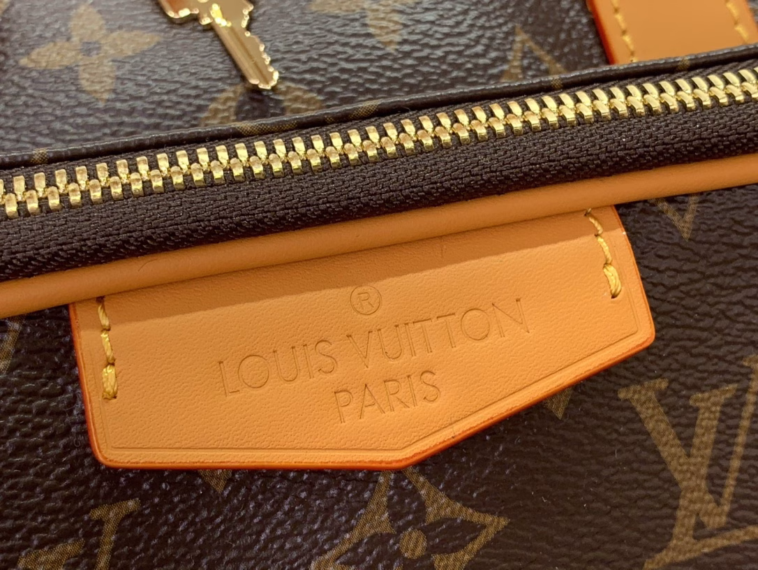 The Keepall Cargo 50 is a modern nod to the House's iconic design from the Monogram Archive collection. Made from Monogram coated canvas, it features distressed calfskin trims and striking hardware, while the main compartment and front pocket zipper pulls are embellished with metallic beads, a nod to Pharrell Williams's latest twist.
