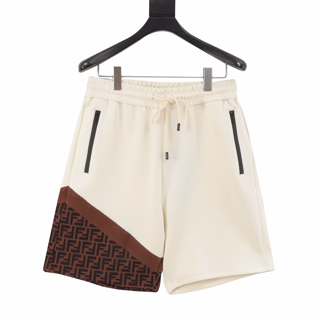 Fendi 25ss laminated zipper pockets with double F woven shortsCustomized fabrics are made of wafer cloth, ultra-high-end knitting technology, fashionable patchwork style,100% cotton air layer fabric, delicate and skin-friendly, comfortable and breathable! The trouser legs are custom-woven and dyed with full-print patchwork design,Zipper pockets on both sides, elastic drawstrings at the waist, and the workmanship details are very good,The upper body effect is first-class, can be matched with couples, don't miss it if you like it!
