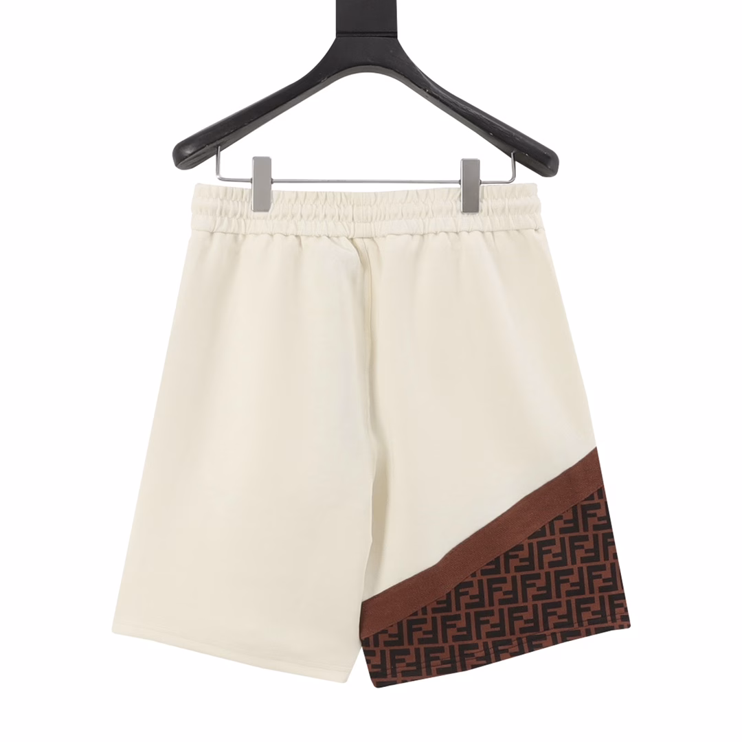 Fendi 25ss laminated zipper pockets with double F woven shortsCustomized fabrics are made of wafer cloth, ultra-high-end knitting technology, fashionable patchwork style,100% cotton air layer fabric, delicate and skin-friendly, comfortable and breathable! The trouser legs are custom-woven and dyed with full-print patchwork design,Zipper pockets on both sides, elastic drawstrings at the waist, and the workmanship details are very good,The upper body effect is first-class, can be matched with couples, don't miss it if you like it!