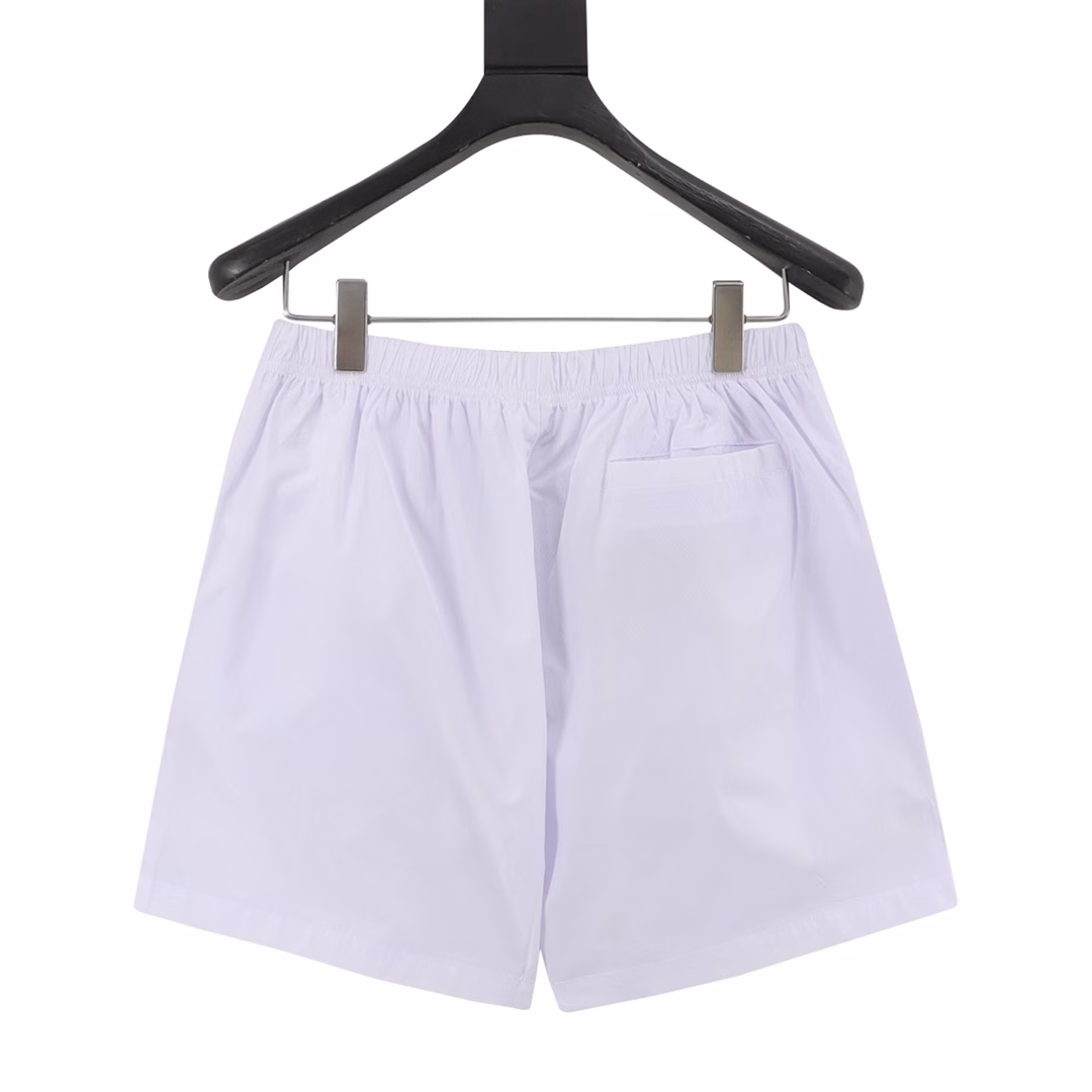 Prada 25ss waist triangle logo beach shortsUsing technical nylon waterproof fabric, thin as a cicada's wing, cool texture, mesh gauze lining, double-layer stitching, metal triangle brand logo nameplate, casual and comfortable, high quality, both colors are recommended