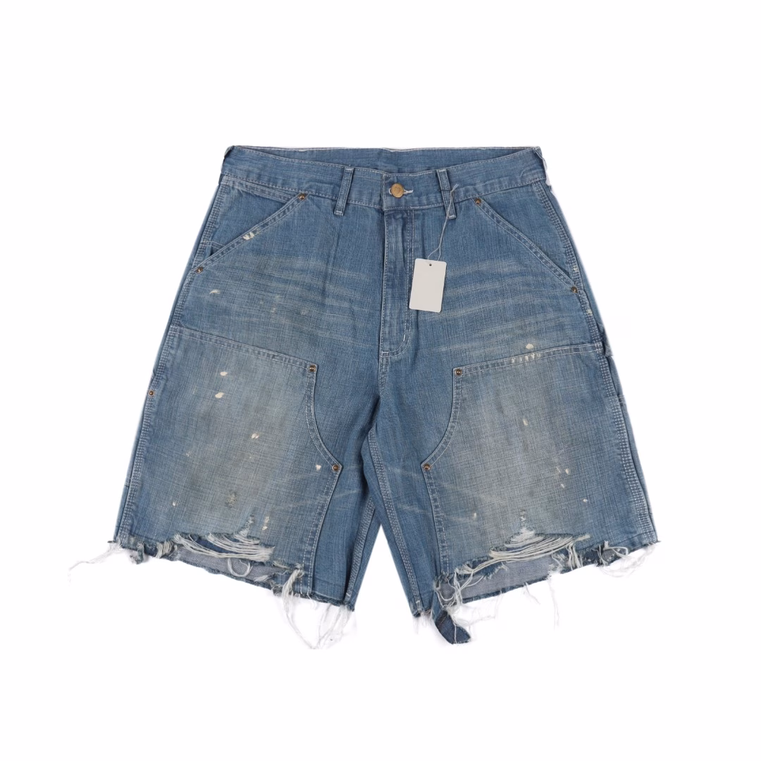 SAINT MICHAEL 25SS Splashed ink fringed logging Denim shortsThe entire pair of trousers is made of 430g 100% pure cotton 15-ounce cyrown denim fabric. The production process of this pair of trousers is more expensive than that of previous trousers. There are too many parts that need to be washed and aged. The re-washing water is used for a chestnut fading treatment to create local mottled fading. The front piece is designed with a practical large pocket, and the edges are reinforced with metal rivets. The deep blue denim base is freely decorated with white ink patterns The feet create a casual and retro artistic feel. The edges are not locked, and the rough edges are treated to drape naturally. It is not a deliberate mess but an unadorned and genuine sense