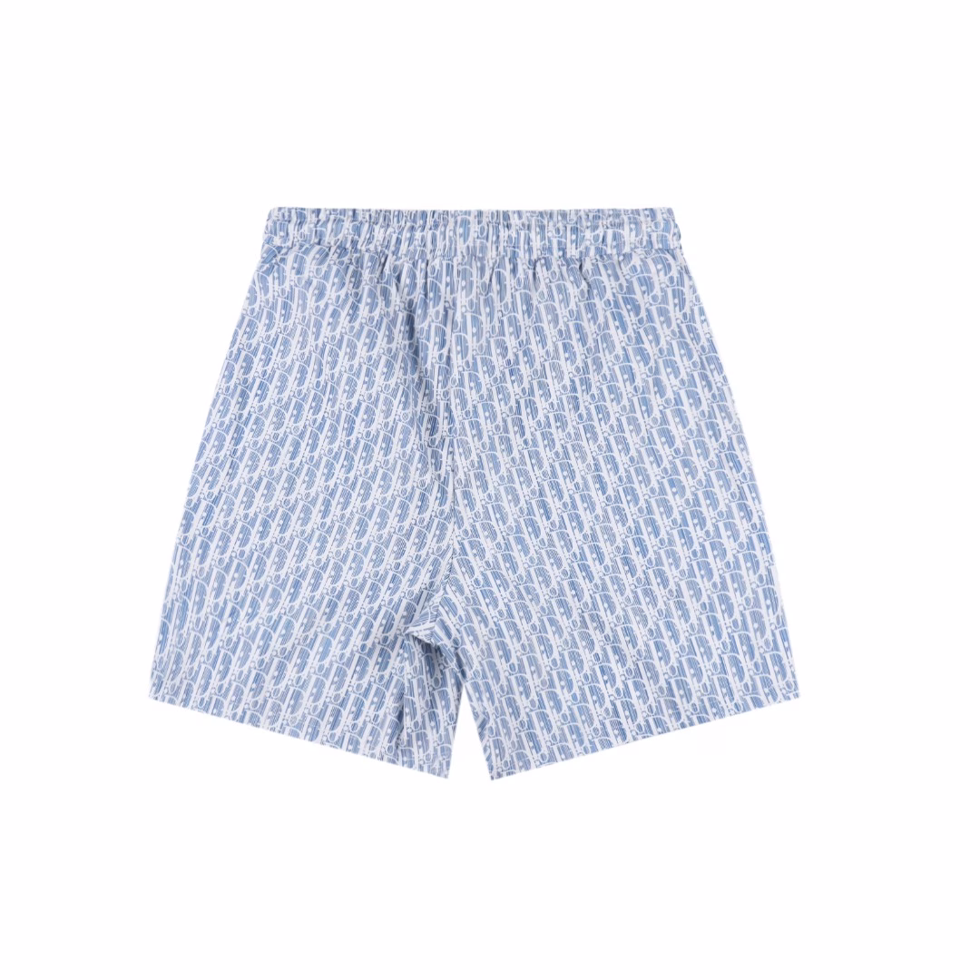Dior 24ss Full Print beach shortsThe CD full-print shorts are made of imported high-count and high-density all-cotton woven fabric. The full-body embossed pattern elements are printed by German original imported digital direct printing machinery. After printing, a penetration process is carried out. Special infrared positioning is used for pattern matching to restore the original pattern matching effect