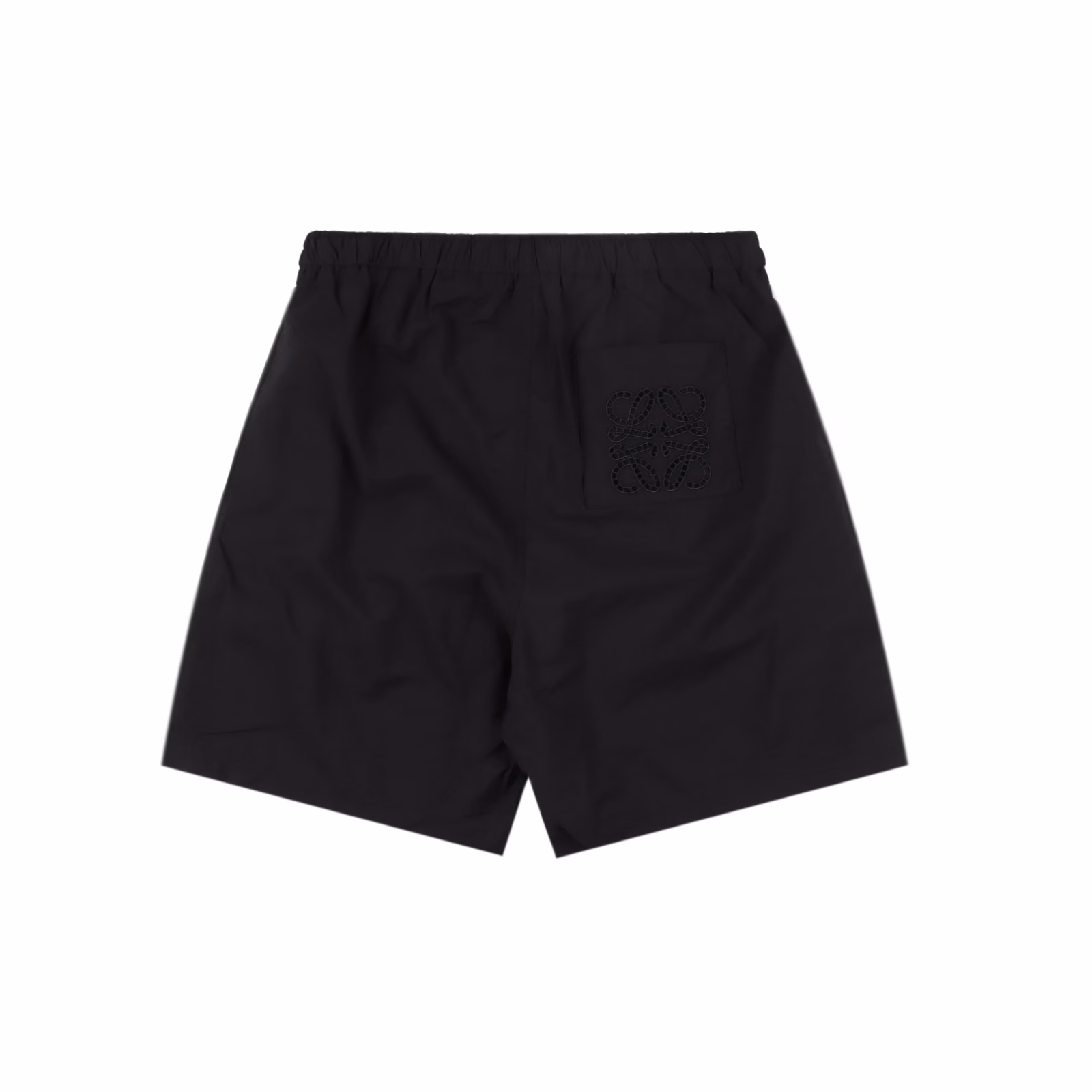 Loewe Back Pocket Hollow Embroidery ShortsMade of 32% nylon and 68% cotton blend. The hydrophobic fibers of nylon form microchannels to accelerate moisture discharge, with a moisture permeability of 4500g/m² for 24 hours, and the tear strength of nylon fibers reaches 45N, making the fabric have good wear resistance. The CAD plate making system is used to preset the solid embroidery area and the hollow area, and a high-precision Anagram embroidery of 35 needles/cm² is formed through a multi-head embroidery machine with a needle speed of 1000rpm. Then use the laser cutting process to accurately remove the base fabric in the embroidery hollow area to form a geometric hole shape. The laser accuracy of ±0.1mm makes the hollow part smooth and without burrs. The overall line is straight and delicate, the fabric is comfortable and soft, and the color is consistent without color difference. It can be matched with the same style to create a fashionable look, suitable for various occasions, customized accessories, three standards are complete, and the same style for men and women