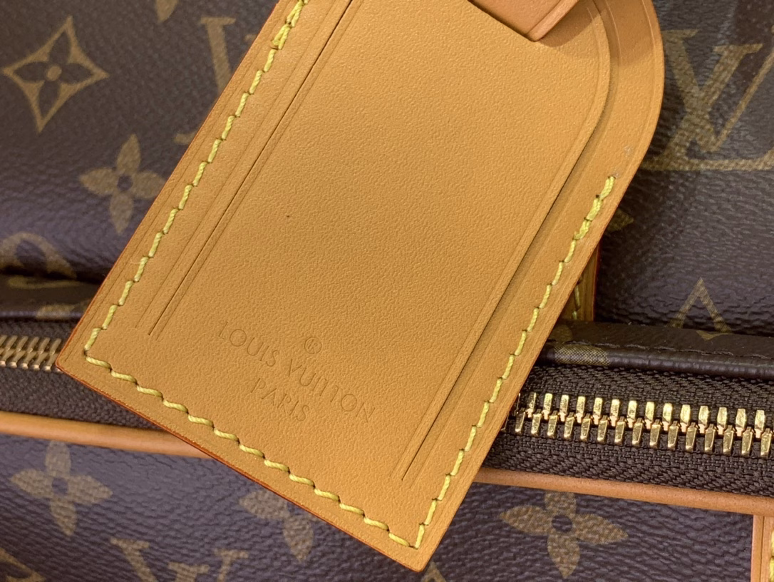 The Keepall Cargo 50 is a modern nod to the House's iconic design from the Monogram Archive collection. Made from Monogram coated canvas, it features distressed calfskin trims and striking hardware, while the main compartment and front pocket zipper pulls are embellished with metallic beads, a nod to Pharrell Williams's latest twist.