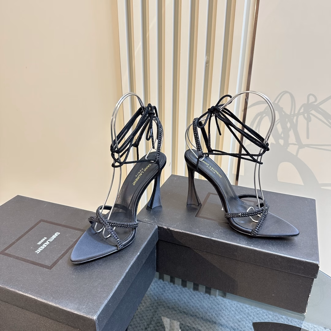 YSL Saint Laurent 🖤 — SS2024 new strappy high-heeled sandals2024 new spring and summer series high-heeled sandals! How can you miss a pair of fairy shoes in the light summer with pointed high heelsPaired with various small skirts, it is not picky about foot shape at allThe transparent sparkling diamonds show fantasy colors under the lightIt is really too beautiful, and the whiteness on the feet is so dazzling! The delicate crystal chain lights up the slender lines of the ankles and releases infinite ♾ elegant charm. Explore more selected high heels!