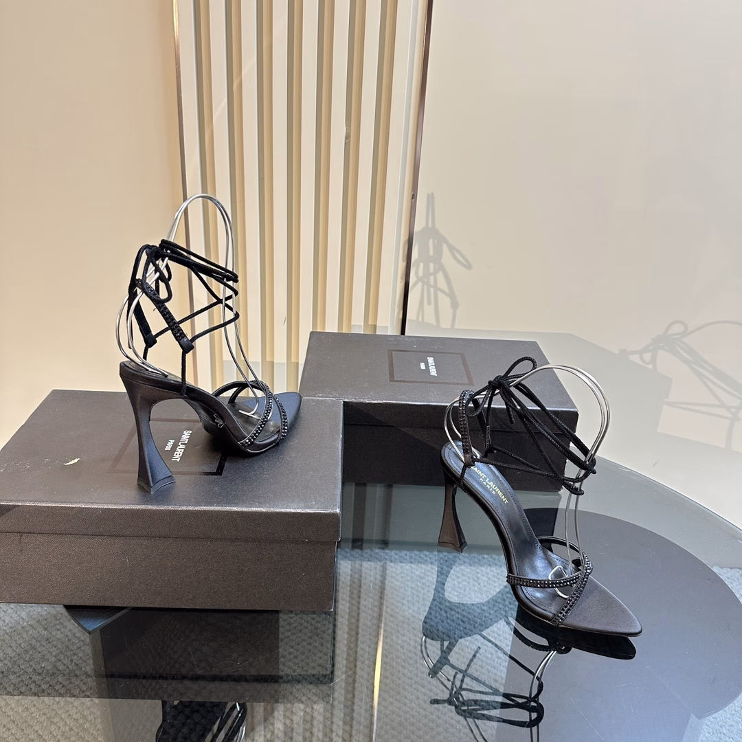 YSL Saint Laurent 🖤 — SS2024 new strappy high-heeled sandals2024 new spring and summer series high-heeled sandals! How can you miss a pair of fairy shoes in the light summer with pointed high heelsPaired with various small skirts, it is not picky about foot shape at allThe transparent sparkling diamonds show fantasy colors under the lightIt is really too beautiful, and the whiteness on the feet is so dazzling! The delicate crystal chain lights up the slender lines of the ankles and releases infinite ♾ elegant charm. Explore more selected high heels!