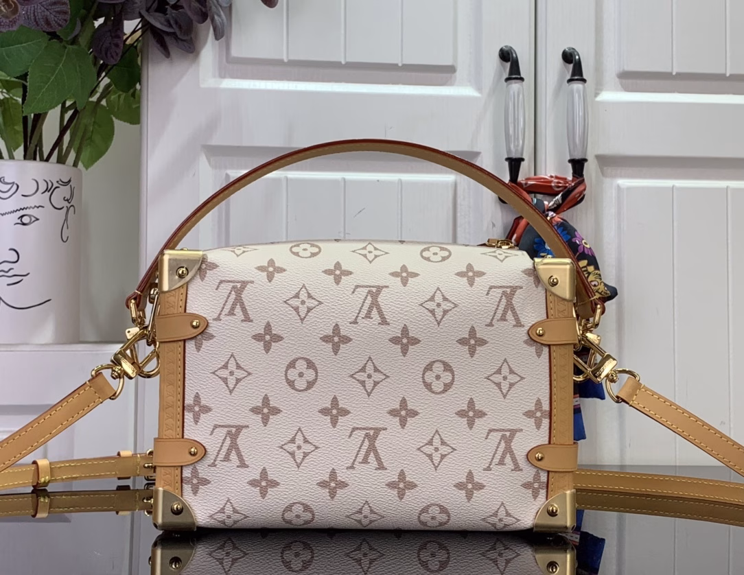 This Side Trunk Medium Bag is made from the brand's classic Monogram canvas, dyed in soft dune tones, and trimmed with cowhide leather for a visual contrast. The dazzling S-lock buckle and metal corners add a sophisticated touch