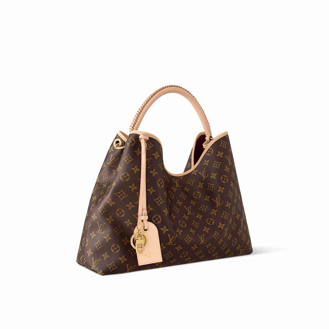 The Again bag is a current, more flexible and iconic reinterpretation of the Artsy model launched in 2010. This meticulously finished version is rooted in the house's heritage and pays homage to its expertise with Monogram canvas, hand-braided handles and a customizable address holder. The room is large enough to hold a laptop and has plenty of pockets. A gold carabiner allows you to attach a playful charm
